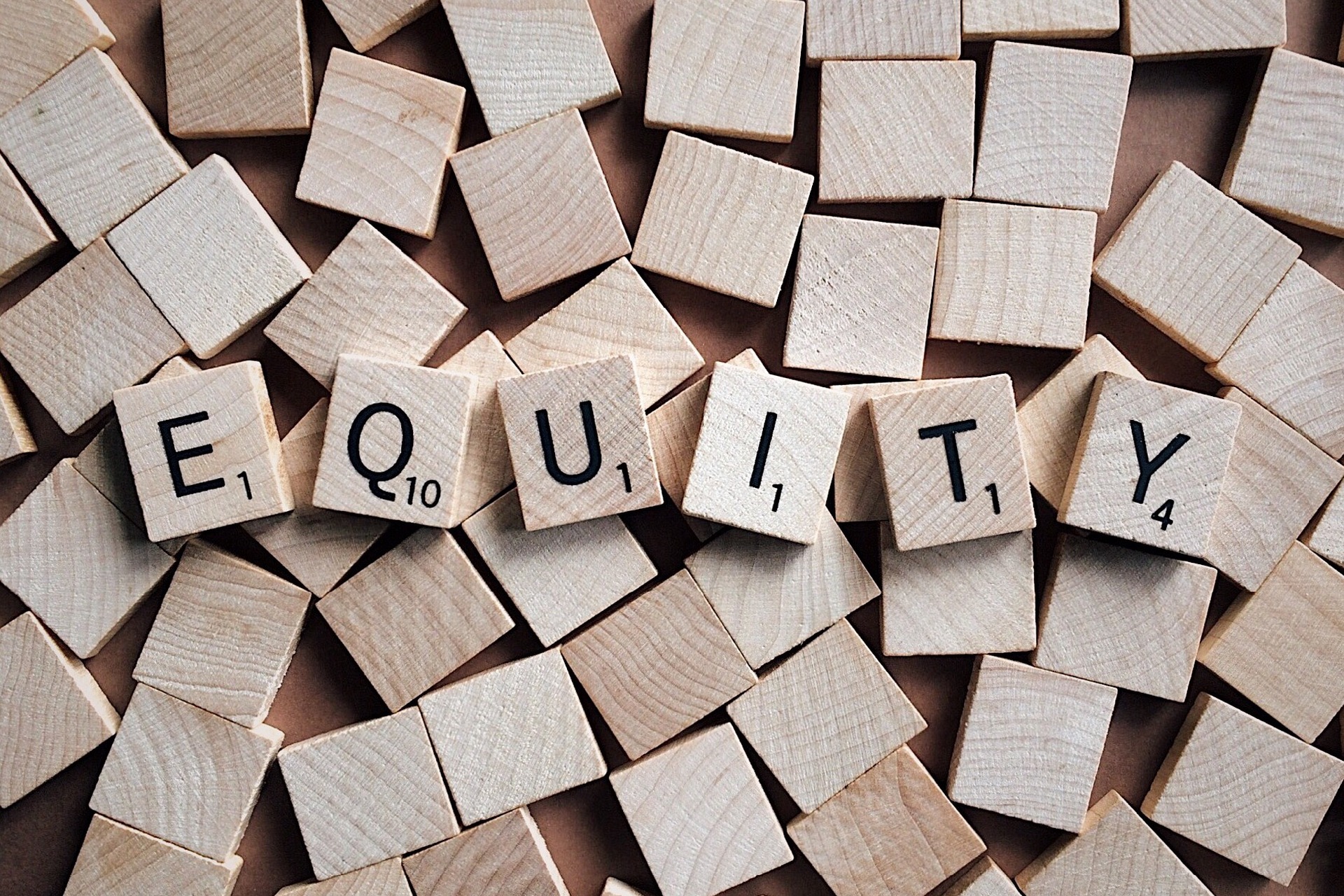 Equity spelled out by boxed letters